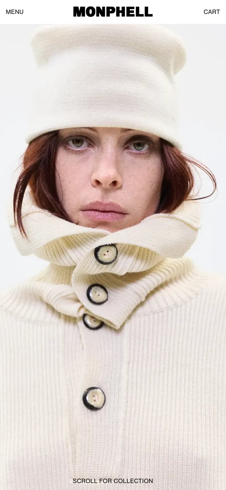 The homepage on a phone: the same portrait in a cream knit hat